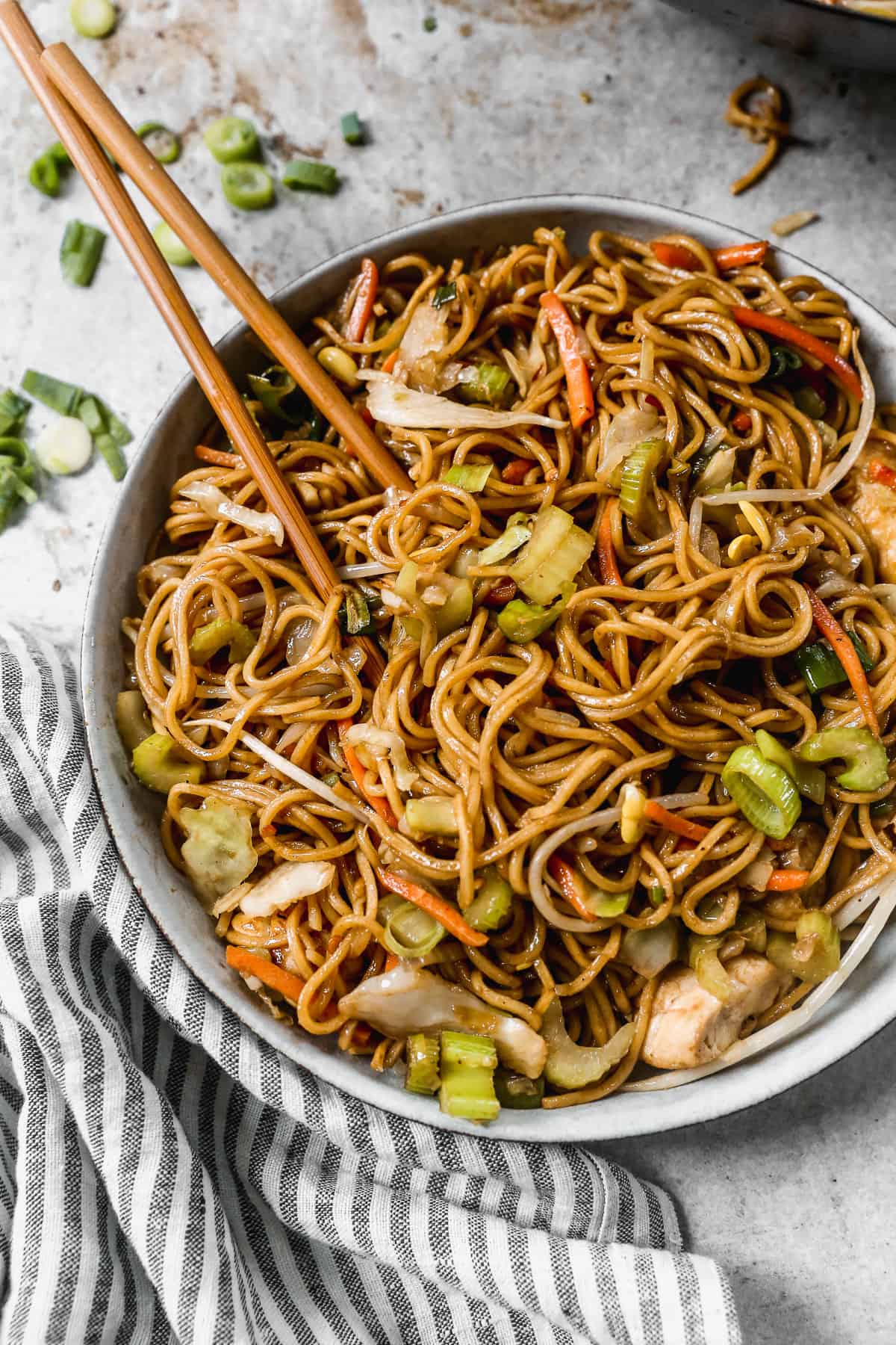 Veg Chowmein — brown stir-fried noodles with cabbage and carrots